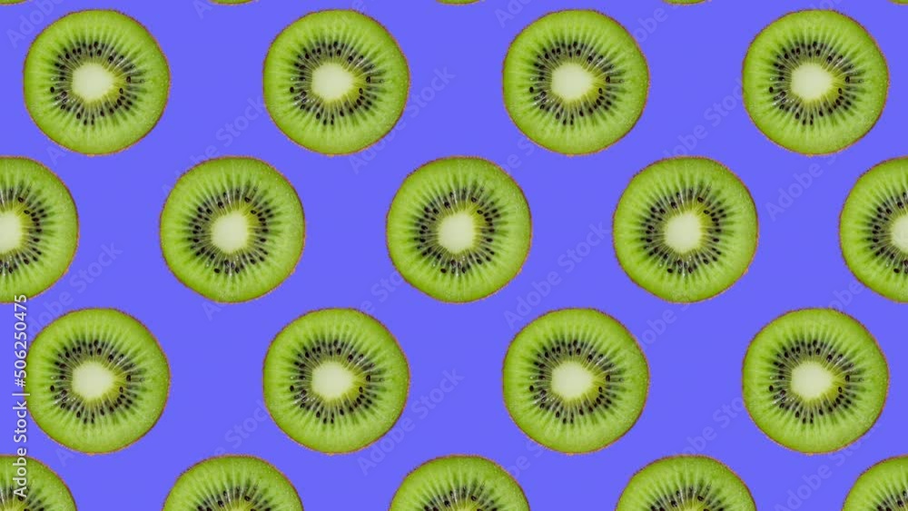 Minimal motion design - Kiwi slices rotating and moving down at violet color background. Trendy colors and style graphics. Seamless looping animation. Minimal motion design - Kiwi slices rotating and moving down at violet color background. Trendy colors and style graphics. Seamless looping animation.