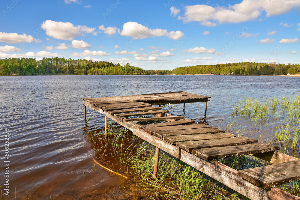 Naklejka premium pier and lake, beautiful summer landscape