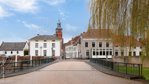 Dutch picturesque town of Buren in the Betuwe, with the church tower of the Sint Lambertuskerk in the background.