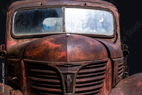 Old Rusty Truck against a black background 