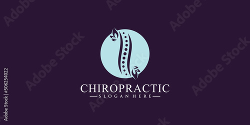 Chiropractic therapy logo with leaf and hand element Premium Vector