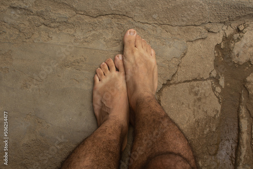feet of a young white man