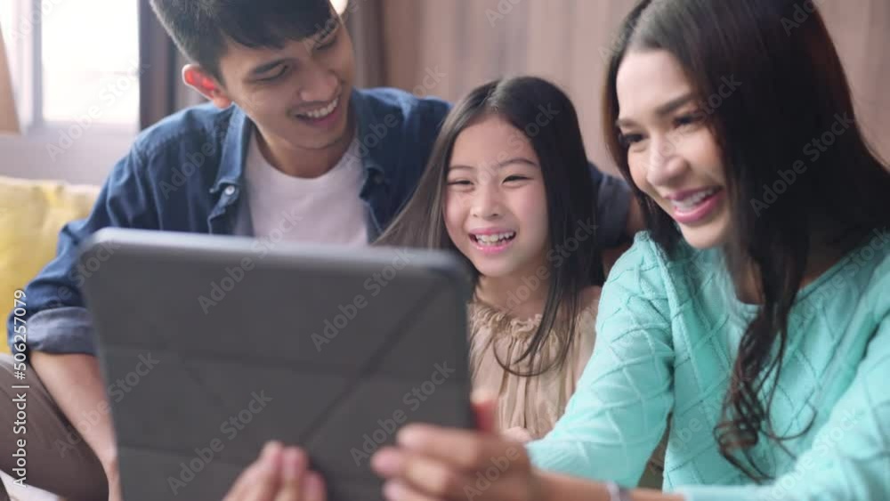 happiness asian family daughter stay together at home using tablet taking selfie photo or video calling to grandparent distancing communication,portrait of selfie family together in living room home happiness asian family daughter stay together at home using tablet taking selfie photo or video calling to grandparent distancing communication,portrait of selfie family together in living room home