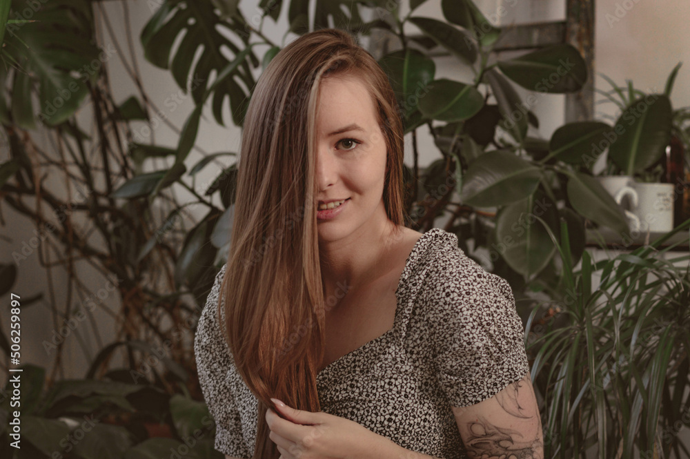girl with long hair on the background of foliage girl with long hair on the background of foliage