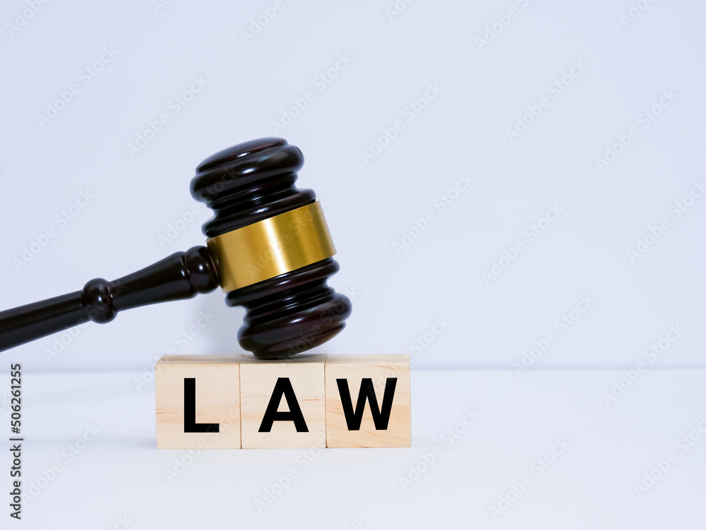 Wooden law gavel and wooden blocks alphabet 