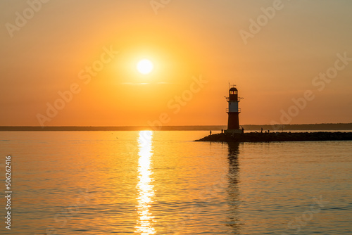 Lighthouse Ostmole Warnemünde at sunrise, Rostock, Germany