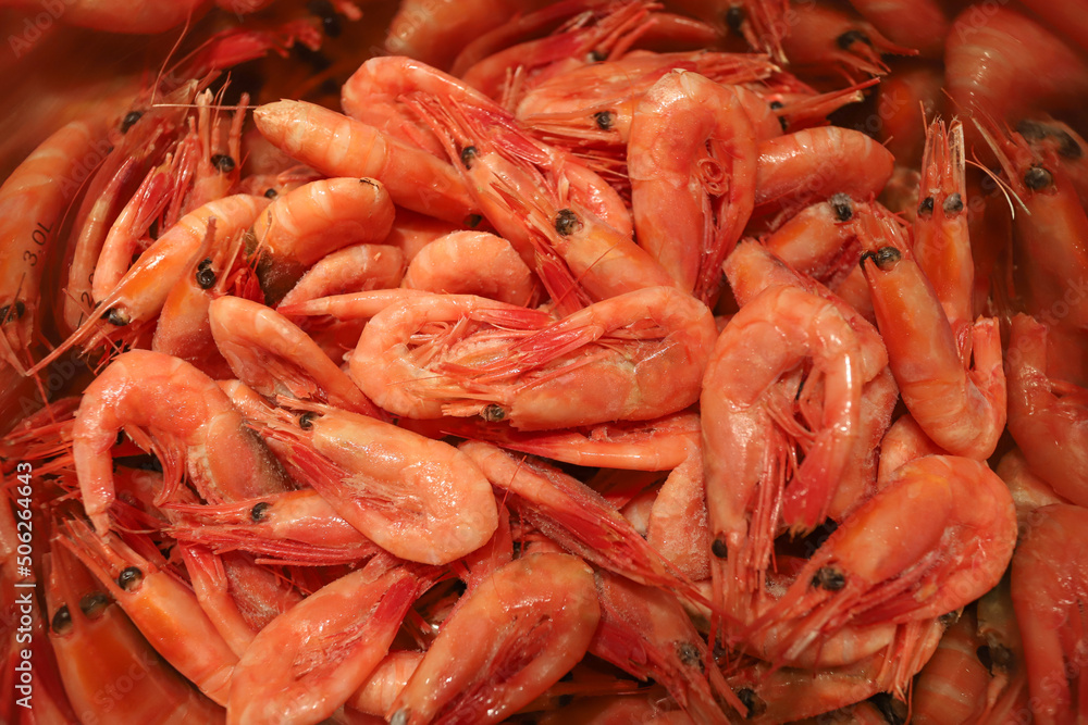 Dry-frozen shrimp in a saucepan before cooking. Dry-frozen shrimp in a saucepan before cooking.