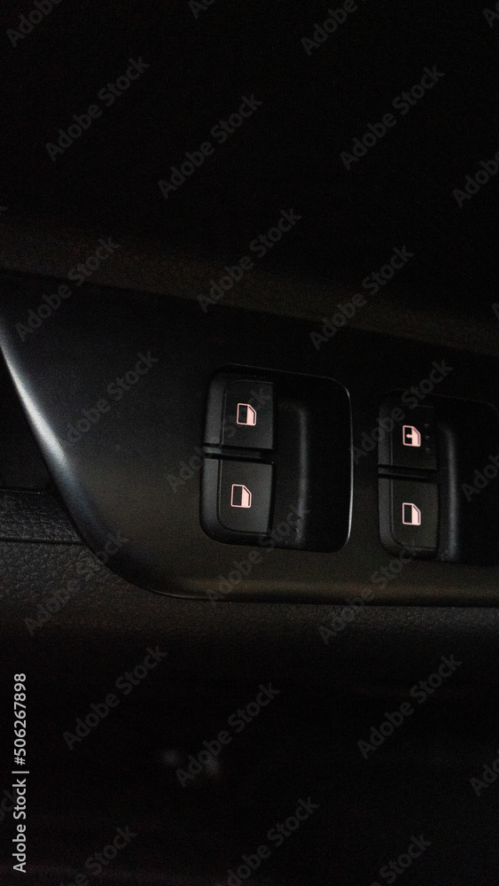 Inside view of car side window control Inside view of car side window control