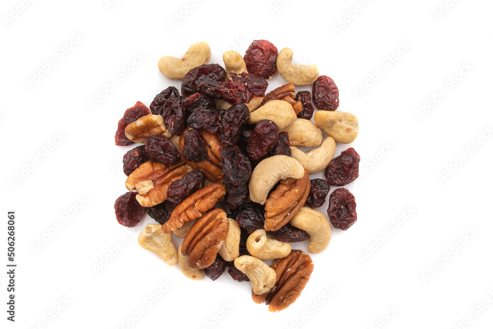A handful of nuts and raisins, isolated on a white background. Nuts are so called because they all have one characteristic in common: they have less than 50% water. A handful of nuts and raisins, isolated on a white background. Nuts are so called because they all have one characteristic in common: they have less than 50% water.