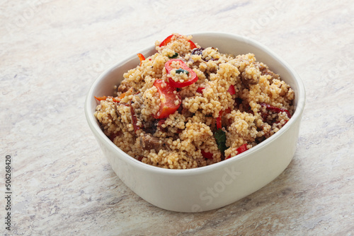 Arabic cous cous with meat and tomato