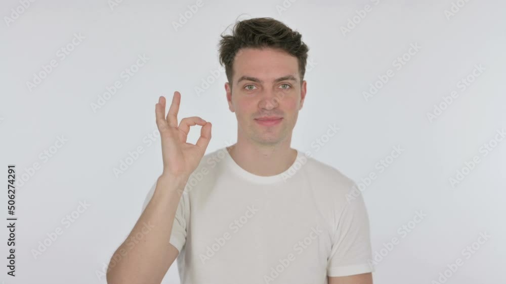 Ok Sign by Young Man on White Background Ok Sign by Young Man on White Background