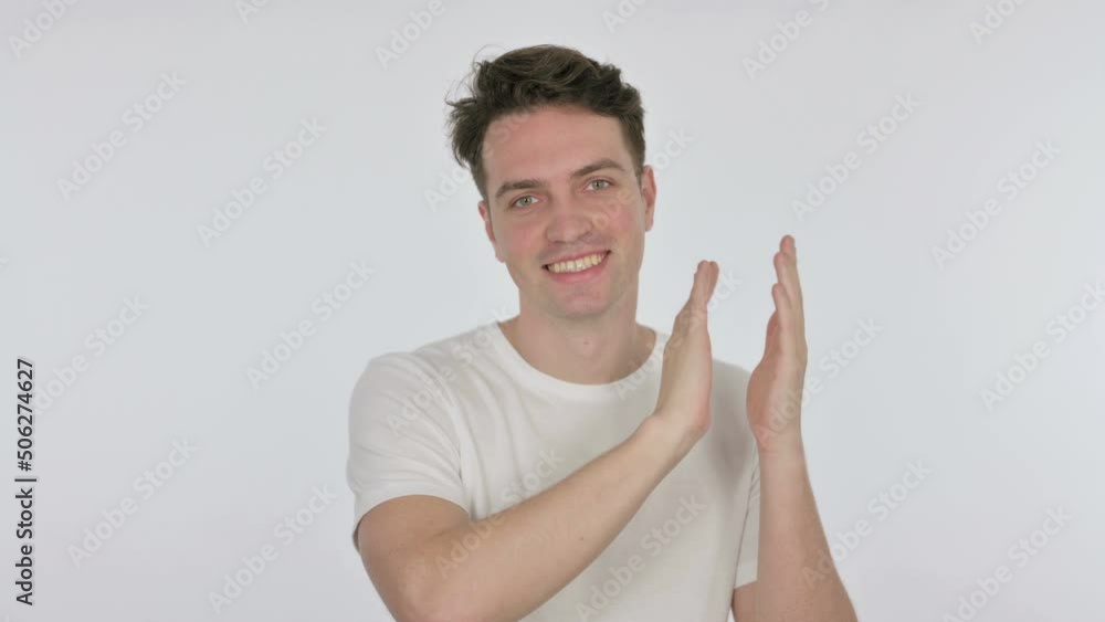 Happy Young Man Clapping on White Background Happy Young Man Clapping on White Background