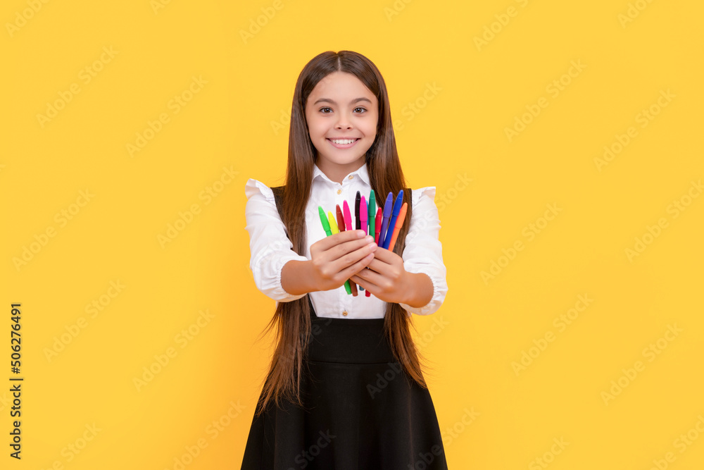 Got new stationery. Happy child hold felt-tips. School stationery. Back to school. Creative education Got new stationery. Happy child hold felt-tips. School stationery. Back to school. Creative education