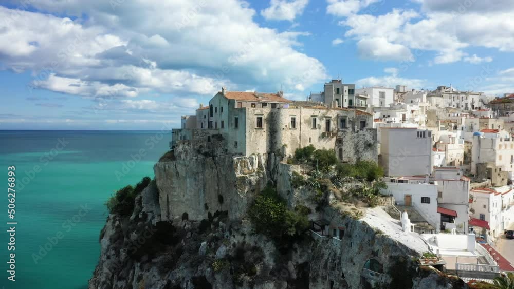 Peschici castle on the edge of the cliff in Europe, Italy, Puglia, towards Foggia, in summer, on a sunny day. Peschici castle on the edge of the cliff in Europe, Italy, Puglia, towards Foggia, in summer, on a sunny day.