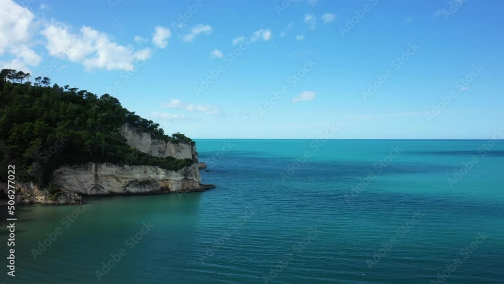 Limestone rocks by the Adriatic Sea in Europe, Italy, Puglia, towards Foggia, in summer, on a sunny day. Limestone rocks by the Adriatic Sea in Europe, Italy, Puglia, towards Foggia, in summer, on a sunny day.