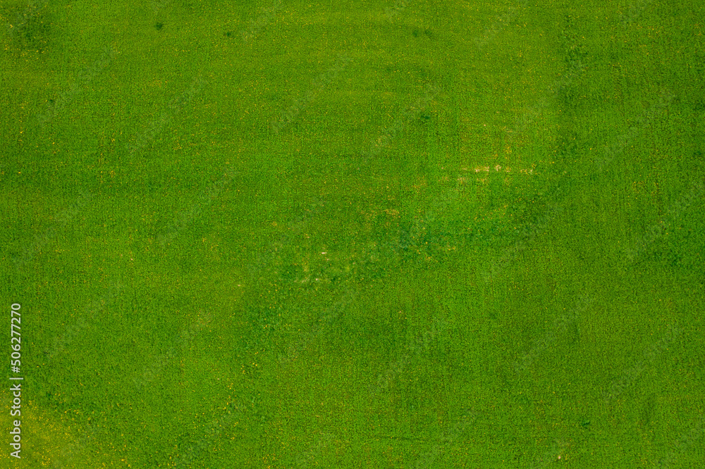 Fototapeta premium Wiejski krajobraz, widok z drona. Zielone pola na północy Polski. Suwalszczyzna wiosną.