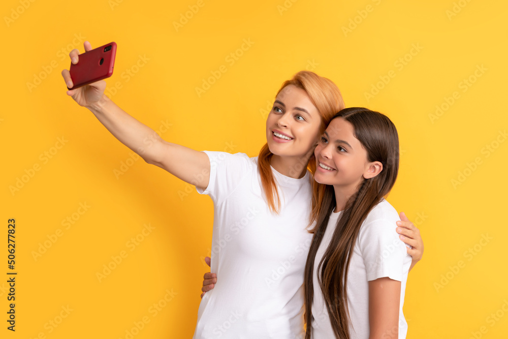 cheerful family of mother woman and child girl making selfie on smartphone, selfie cheerful family of mother woman and child girl making selfie on smartphone, selfie