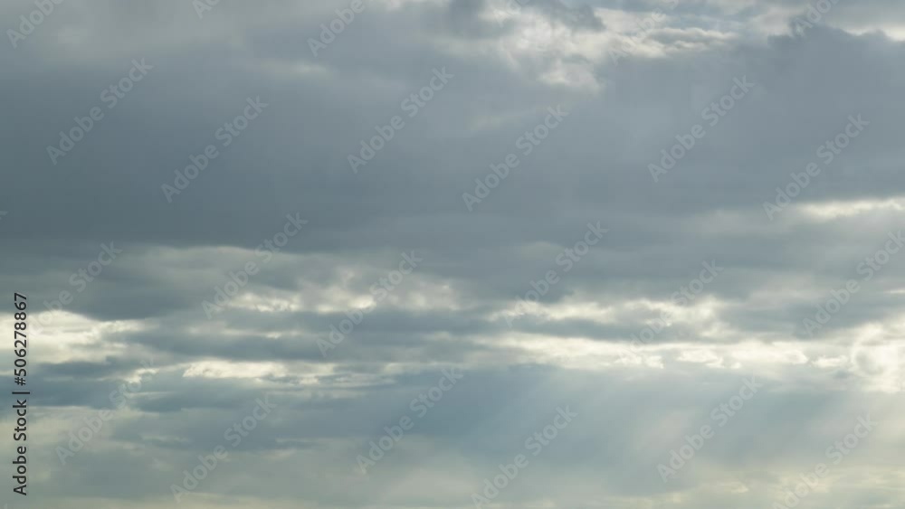 Dramatic cloudscape time lapse. Dark scene with white grey clouds
Dramatic cloudscape time lapse. Dark scene with white grey clouds