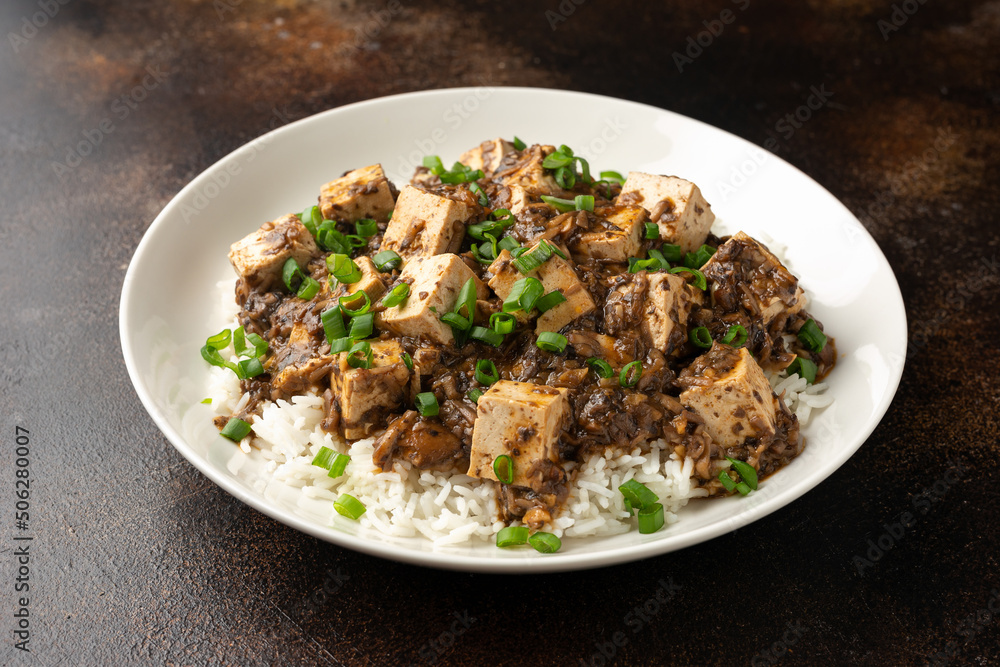 Vegan Mapo tofu with mushroom and rice. Asian, Chinese food Vegan Mapo tofu with mushroom and rice. Asian, Chinese food
