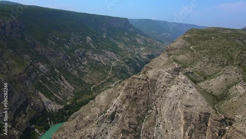 Wallpaper Mural Sulak canyon - the deepest canyon in Europe on a sunny summer day. The turquoise waters of the Sulak River flow through the gorge. Tourist attraction. The Republic of Dagestan. Drone view. Torontodigital.ca