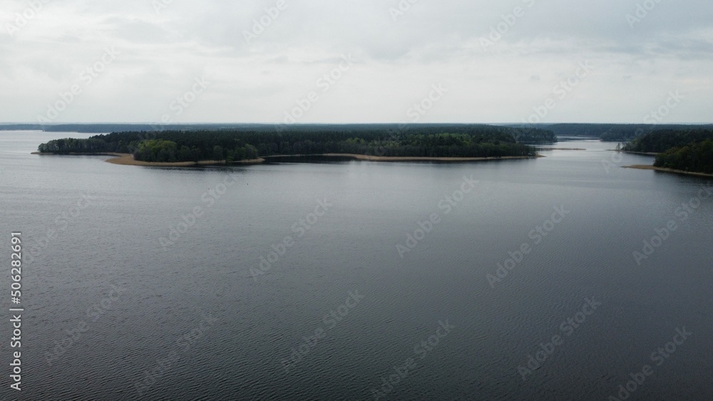 Isolated island on empty lake in North Eastern Poland