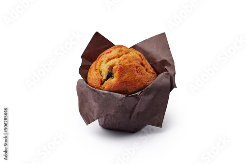 Delicious blueberry muffin wrapped with paper on white