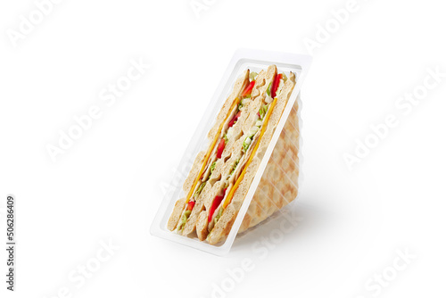 Sandwiches with ham and cheese with pitas in container