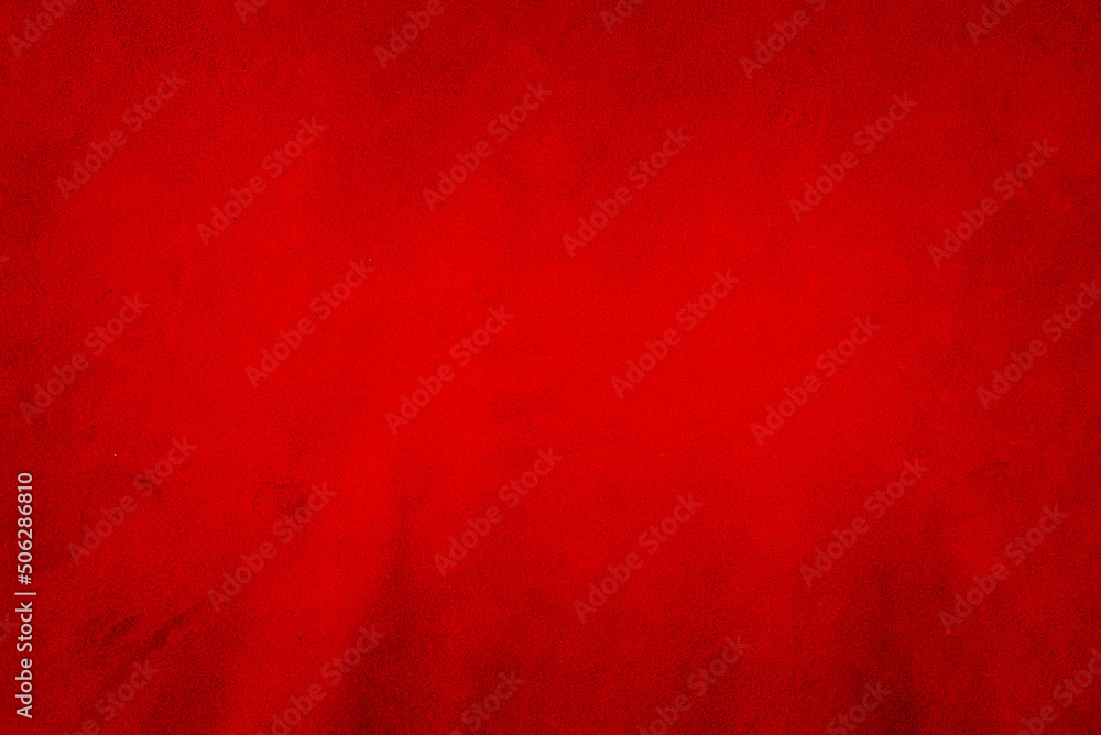 Red matte background of suede. Velvet texture of seamless leather. Red suede texture.