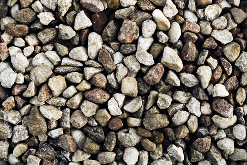 Gravel texture. Stones background. Rocks pattern. Little stones background. Gray noise backdrop. Pebble texture. Pile of rocks.