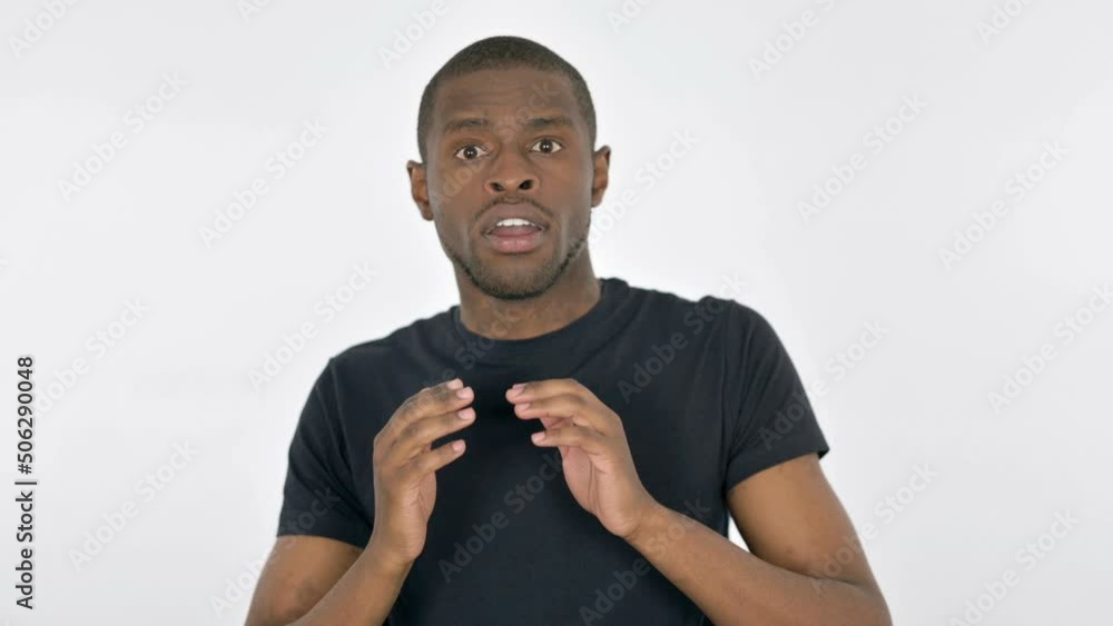 Shocked Young African Man Wondering on White Background Shocked Young African Man Wondering on White Background
