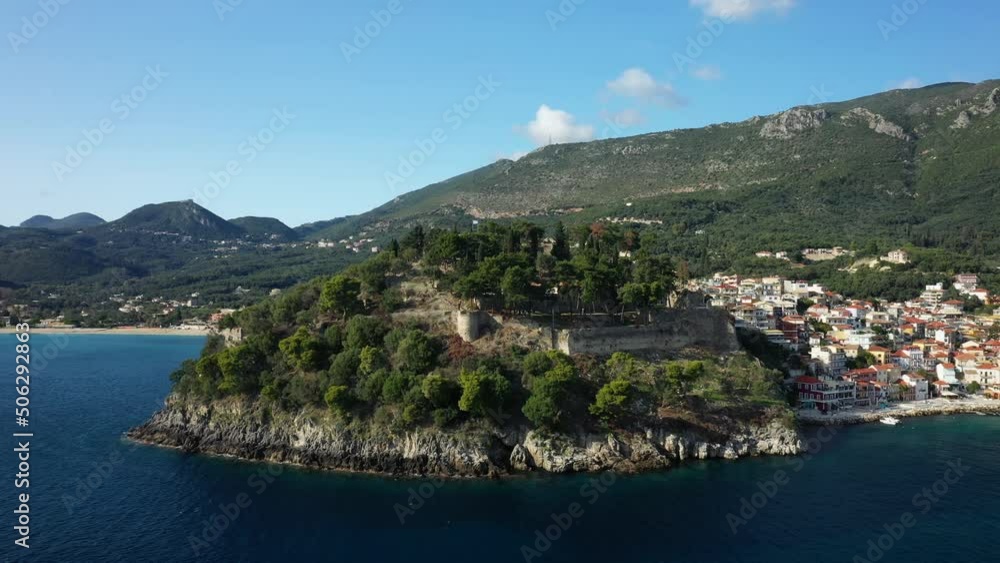 The castle in Parga bay in Europe, Greece, Epirus in summer on a sunny day. The castle in Parga bay in Europe, Greece, Epirus in summer on a sunny day.