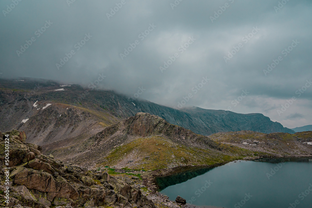 fog over the lake in the Mountains fog over the lake in the Mountains