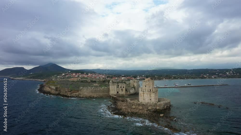The Chateau de Methoni in Modon facing the Mediterranean Sea in Europe, Greece, the Peloponnese, Mani, in summer, on a sunny day. The Chateau de Methoni in Modon facing the Mediterranean Sea in Europe, Greece, the Peloponnese, Mani, in summer, on a sunny day.