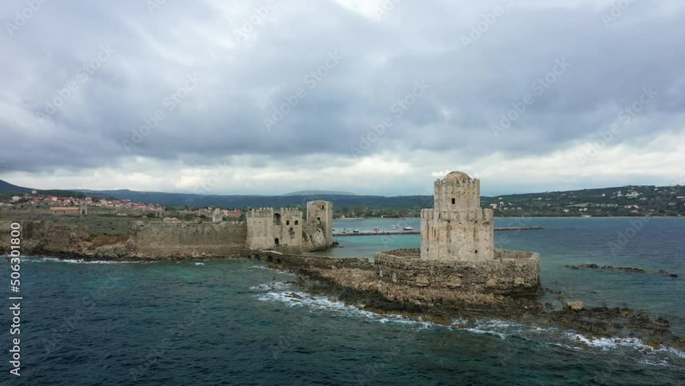 The maritime entrance to the Chateau de Methoni in Modon in Europe, Greece, the Peloponnese, Mani, in summer, on a sunny day. The maritime entrance to the Chateau de Methoni in Modon in Europe, Greece, the Peloponnese, Mani, in summer, on a sunny day.