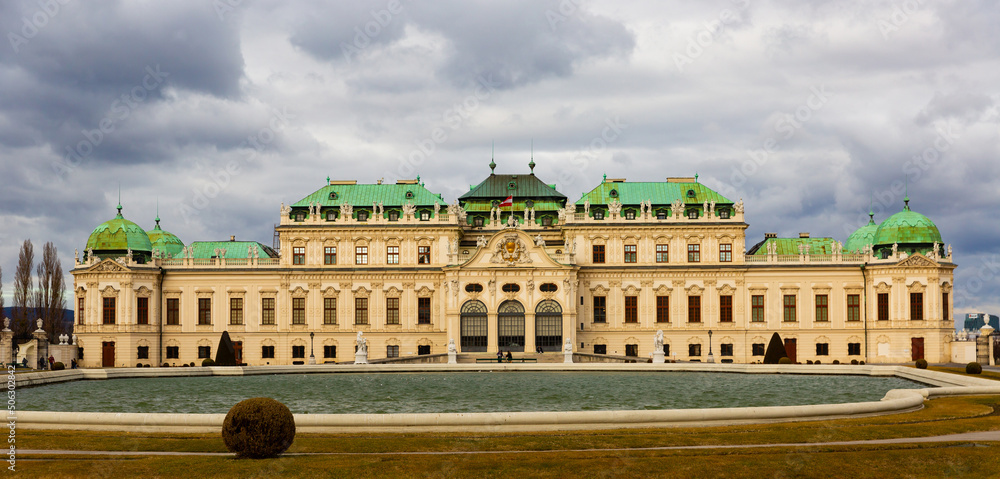Scenic view of impressive Baroque building of upper palace in Belvedere complex in Vienna, Austria on murky winter day..