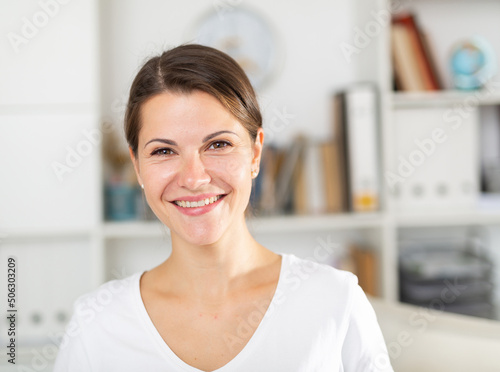 Successful business woman posing in her office Free Download Successful business woman posing in her office - GFXLoad