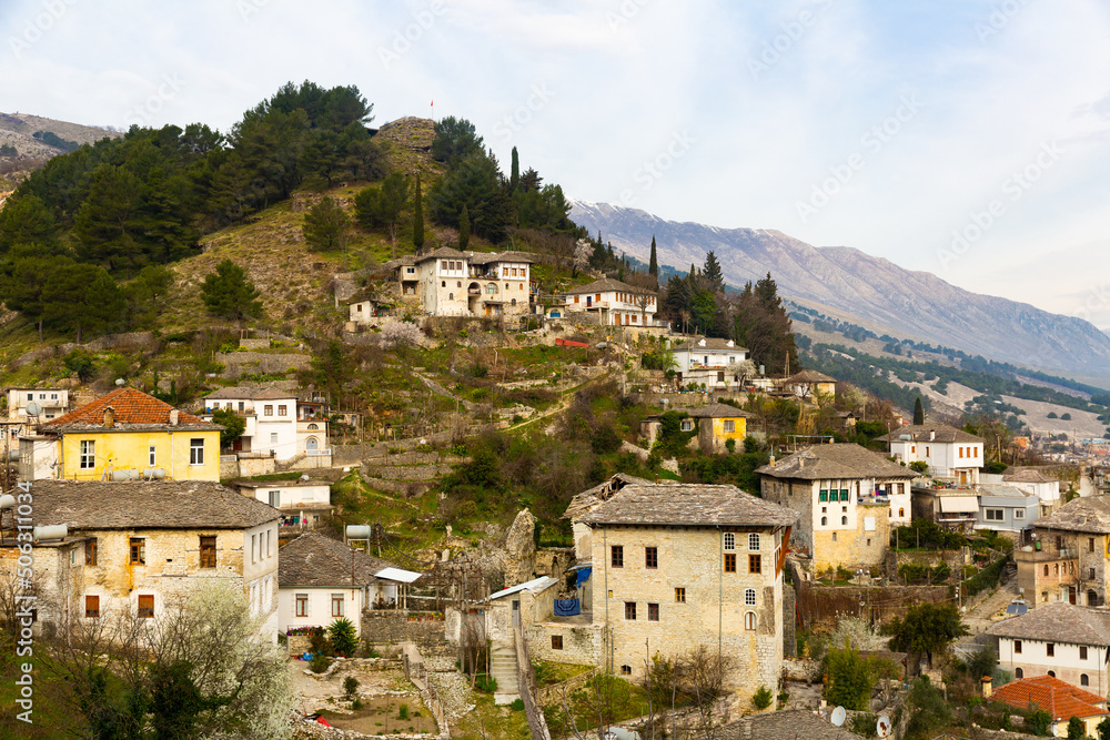 Cityscape of Gjirokaster, Albania. Old houses of Gjirokaster streets on descent of Gjere mountains.
