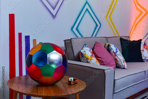 room with colorful decor and ball 