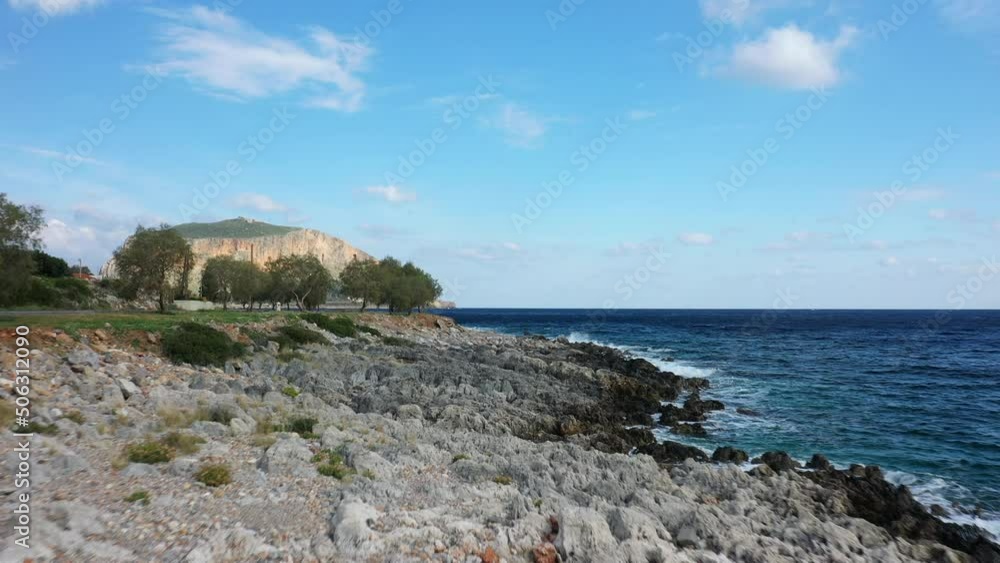 The rocky beaches facing Monemvasia in Europe, Greece, Peloponnese, Arcadia, in summer, on a sunny day. The rocky beaches facing Monemvasia in Europe, Greece, Peloponnese, Arcadia, in summer, on a sunny day.