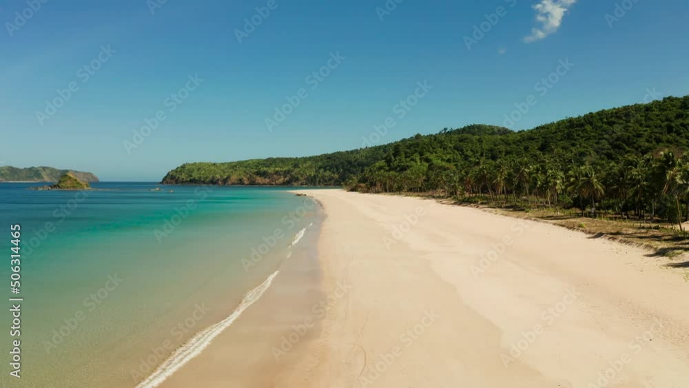 Aerial drone of Seascape with sandy beach and blue water. Nacpan, El Nido, Palawan, Philippine Islands. Seascape with tropical beach and islands. Summer and travel vacation concept Aerial drone of Seascape with sandy beach and blue water. Nacpan, El Nido, Palawan, Philippine Islands. Seascape with tropical beach and islands. Summer and travel vacation concept