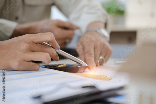 Close up view of lawyer or financial advisor  making loan offer, giving legal advice, selling insurance or real estate to elderly customer.