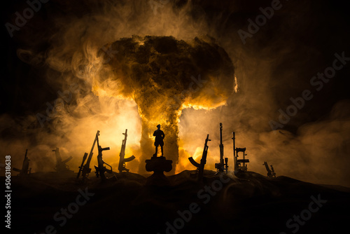 Creative artwork decoration war on Ukraine. Crowd looking on giant explosion and attacking soldiers.