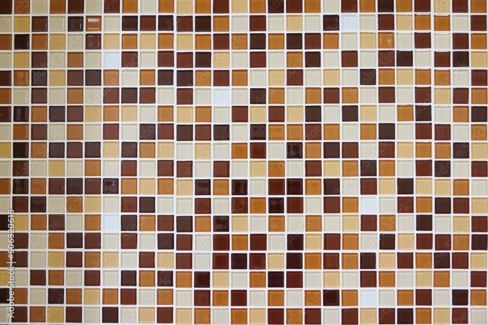brown and white mosaic pattern in toilet wall. brown mosaic background and texture. brown and white mosaic pattern in toilet wall. brown mosaic background and texture.