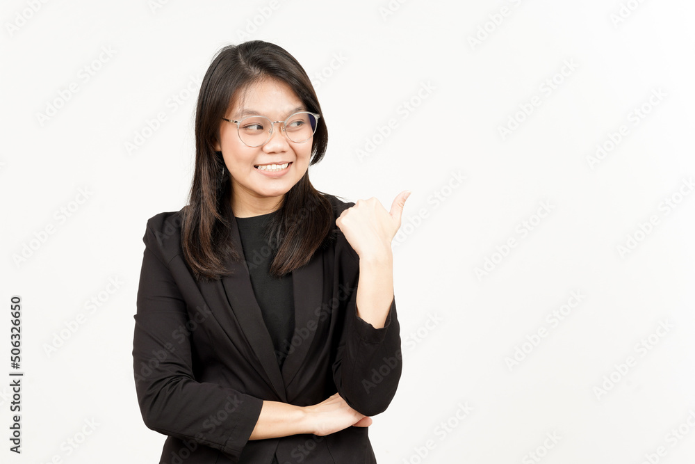 Presenting and Pointing Side Product Using Thumb Of Beautiful Asian Woman Wearing Black Blazer Presenting and Pointing Side Product Using Thumb Of Beautiful Asian Woman Wearing Black Blazer