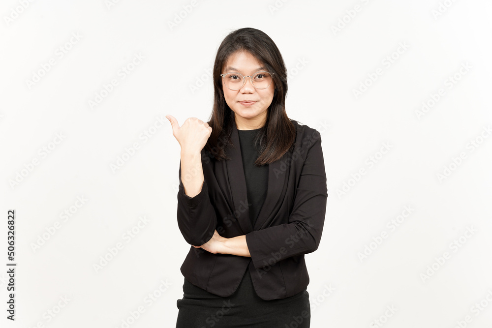 Presenting and Pointing Side Product Using Thumb Of Beautiful Asian Woman Wearing Black Blazer Presenting and Pointing Side Product Using Thumb Of Beautiful Asian Woman Wearing Black Blazer
