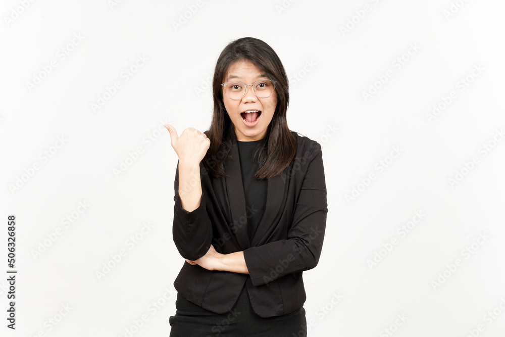Presenting and Pointing Side Product Using Thumb Of Beautiful Asian Woman Wearing Black Blazer Presenting and Pointing Side Product Using Thumb Of Beautiful Asian Woman Wearing Black Blazer