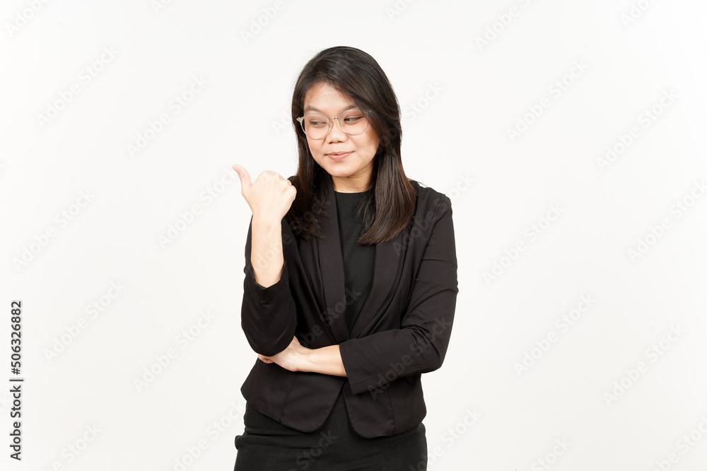 Presenting and Pointing Side Product Using Thumb Of Beautiful Asian Woman Wearing Black Blazer Presenting and Pointing Side Product Using Thumb Of Beautiful Asian Woman Wearing Black Blazer