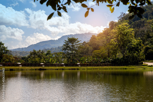 Lake in nature park with beautiful reflections of mountains on summer time. holiday concept photo