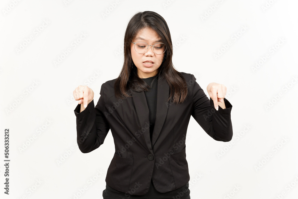 Showing Product and Pointing Down Of Beautiful Asian Woman Wearing Black Blazer Isolated On White Showing Product and Pointing Down Of Beautiful Asian Woman Wearing Black Blazer Isolated On White