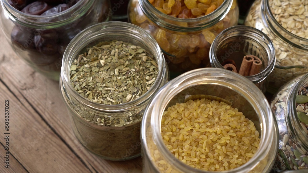 Grocery stock, food reserve. Glass Cereal Jars. Zero Waste Shopping. Shop in Bulk. Buying and Storage Food Package free. Reduce packaging waste. Healthy eating Grocery stock, food reserve. Glass Cereal Jars. Zero Waste Shopping. Shop in Bulk. Buying and Storage Food Package free. Reduce packaging waste. Healthy eating